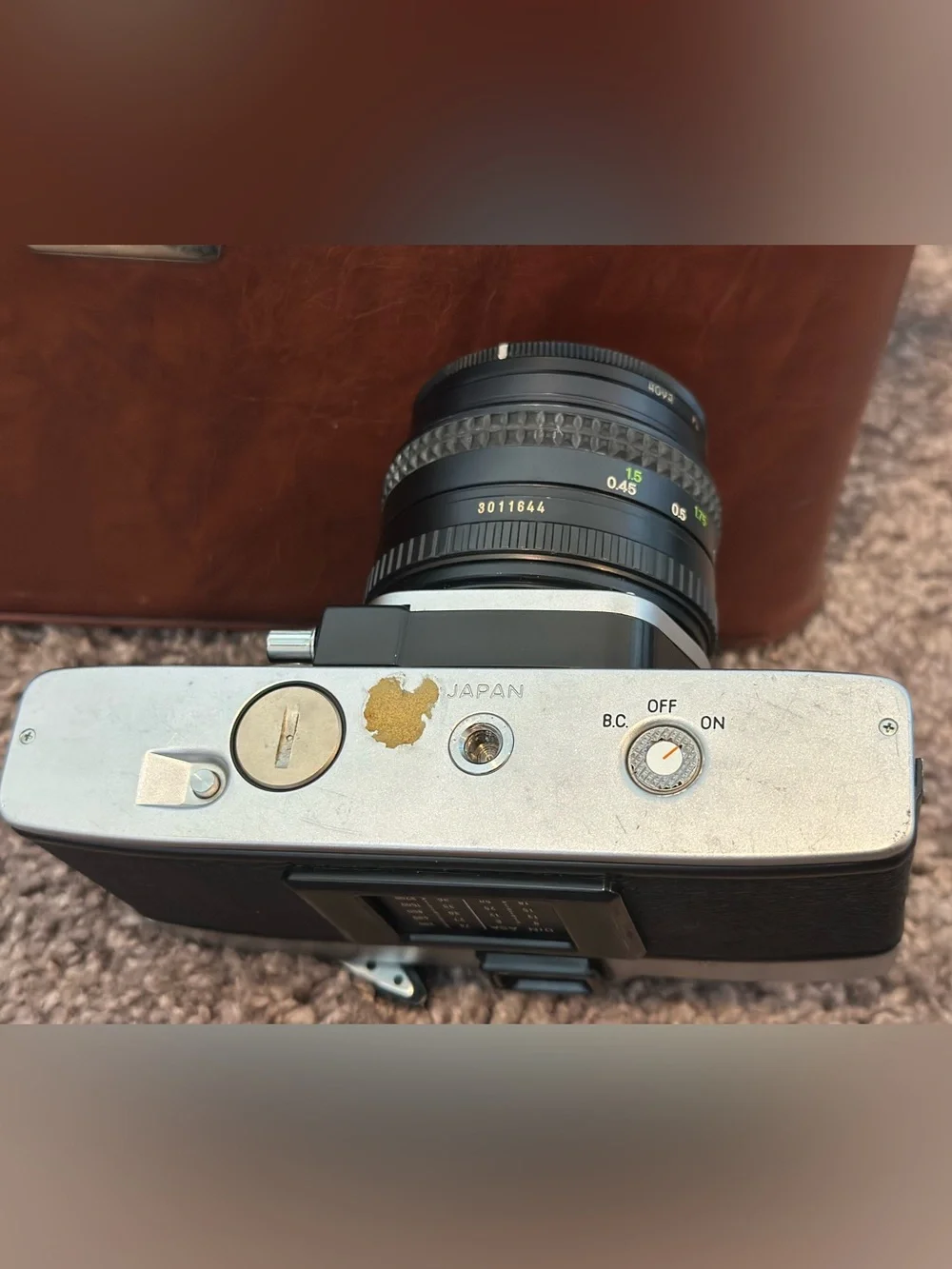 3-set Minolta SLR Film Camera with Brown Case and Extra Lens